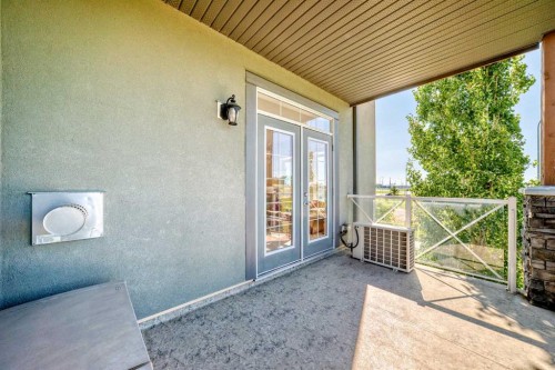 216-1005B Westmount Drive, Strathmore, AB - Outdoor With Deck Patio Veranda With Exterior