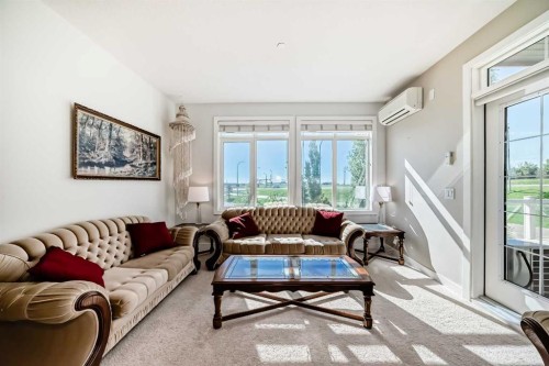 216-1005B Westmount Drive, Strathmore, AB - Indoor Photo Showing Living Room