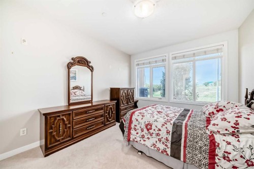 216-1005B Westmount Drive, Strathmore, AB - Indoor Photo Showing Bedroom