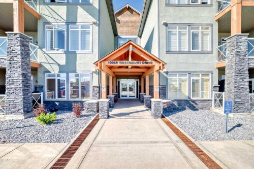 216-1005B Westmount Drive, Strathmore, AB - Outdoor With Facade