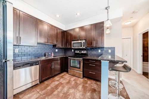 216-1005B Westmount Drive, Strathmore, AB - Indoor Photo Showing Kitchen