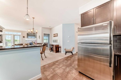 216-1005B Westmount Drive, Strathmore, AB - Indoor Photo Showing Kitchen