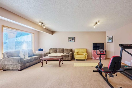 60 Edgeridge Close Nw, Calgary, AB - Indoor Photo Showing Gym Room