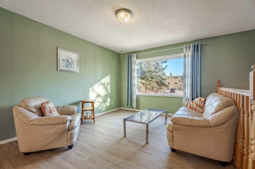 3152 Blakiston Drive Nw, Calgary, AB - Indoor Photo Showing Living Room