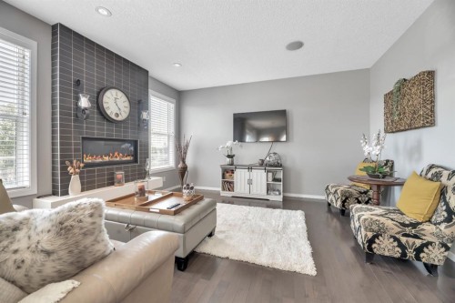 54 Chaparral Valley Square Se, Calgary, AB - Indoor Photo Showing Living Room With Fireplace