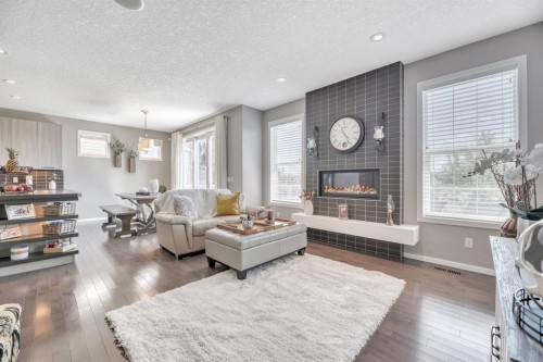 54 Chaparral Valley Square Se, Calgary, AB - Indoor Photo Showing Living Room With Fireplace