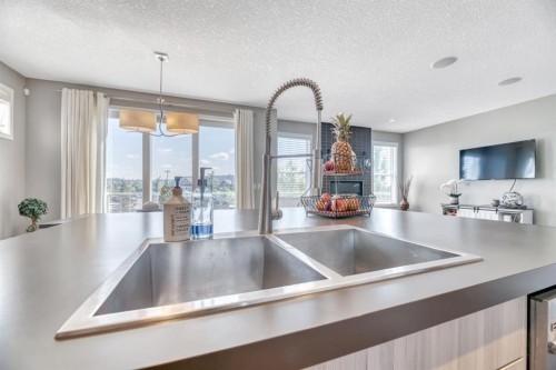 54 Chaparral Valley Square Se, Calgary, AB - Indoor Photo Showing Kitchen With Double Sink