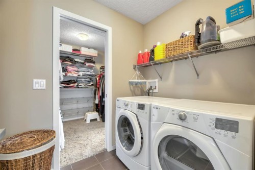 54 Chaparral Valley Square Se, Calgary, AB - Indoor Photo Showing Laundry Room