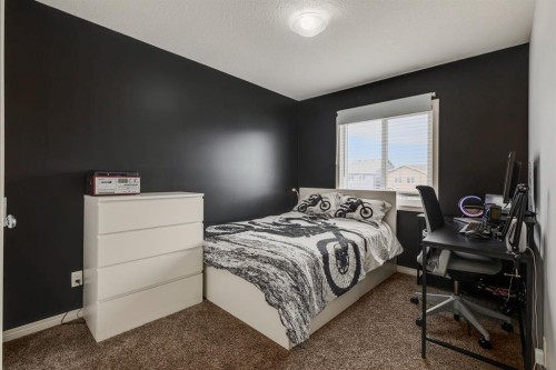 53 Seton Manor Se, Calgary, AB - Indoor Photo Showing Bedroom
