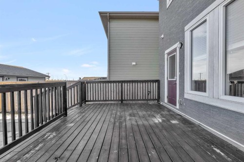 166 Marquis Heights Se, Calgary, AB - Outdoor With Deck Patio Veranda With Exterior