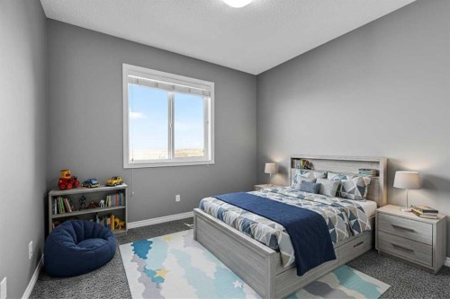 166 Marquis Heights Se, Calgary, AB - Indoor Photo Showing Bedroom