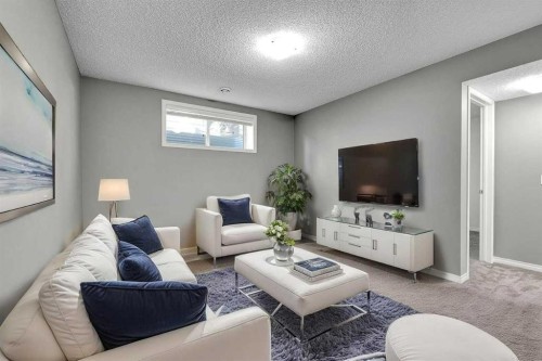 166 Marquis Heights Se, Calgary, AB - Indoor Photo Showing Living Room