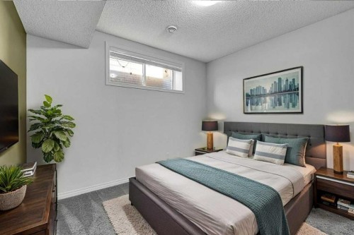 166 Marquis Heights Se, Calgary, AB - Indoor Photo Showing Bedroom