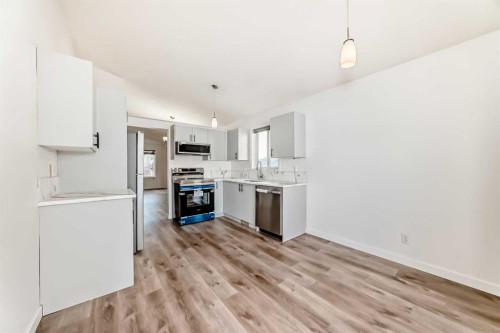 16218 Shawbrooke Road Sw, Calgary, AB - Indoor Photo Showing Kitchen With Stainless Steel Kitchen