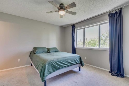 219 Chapalina Place Se, Calgary, AB - Indoor Photo Showing Bedroom