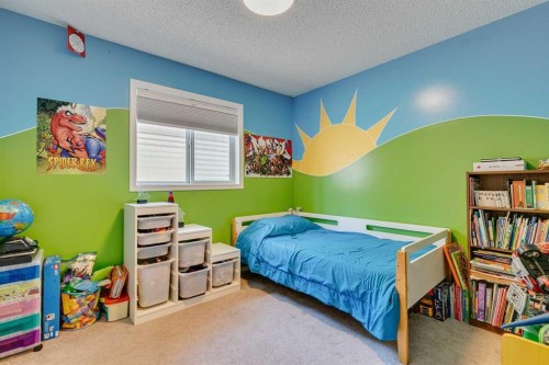 219 Chapalina Place Se, Calgary, AB - Indoor Photo Showing Bedroom