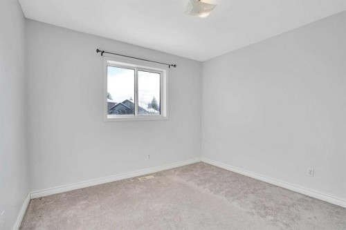 46 Somerset Close Sw, Calgary, AB - Indoor Photo Showing Other Room