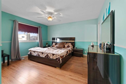 892 Abbotsford Drive Ne, Calgary, AB - Indoor Photo Showing Bedroom