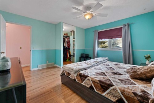 892 Abbotsford Drive Ne, Calgary, AB - Indoor Photo Showing Bedroom