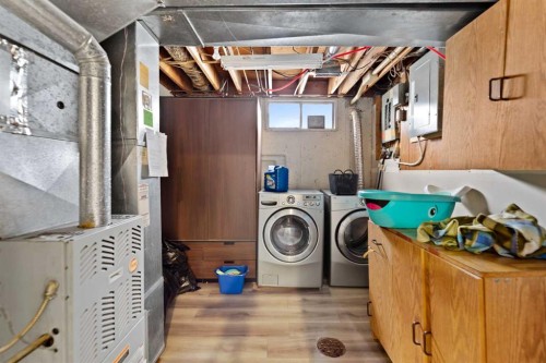 892 Abbotsford Drive Ne, Calgary, AB - Indoor Photo Showing Laundry Room
