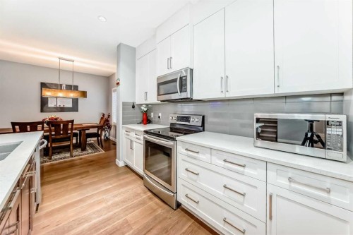 512 Baysprings Lane Sw, Airdrie, AB - Indoor Photo Showing Kitchen