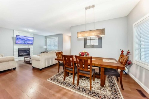 512 Baysprings Lane Sw, Airdrie, AB - Indoor With Fireplace