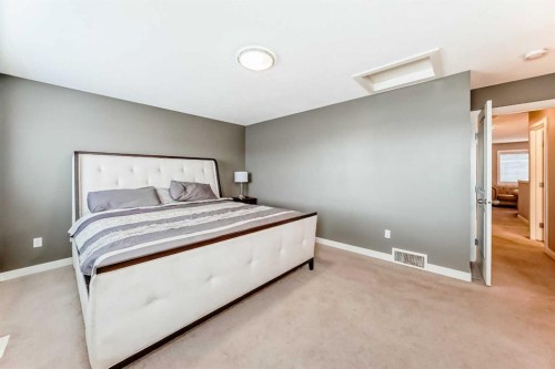 512 Baysprings Lane Sw, Airdrie, AB - Indoor Photo Showing Bedroom