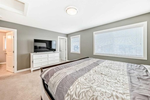 512 Baysprings Lane Sw, Airdrie, AB - Indoor Photo Showing Bedroom