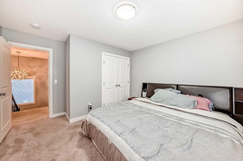 512 Baysprings Lane Sw, Airdrie, AB - Indoor Photo Showing Bedroom