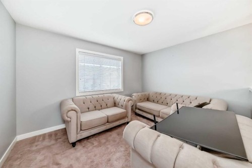 512 Baysprings Lane Sw, Airdrie, AB - Indoor Photo Showing Living Room