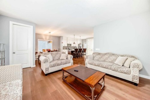 512 Baysprings Lane Sw, Airdrie, AB - Indoor Photo Showing Living Room