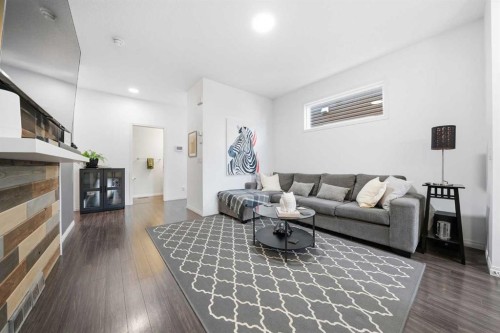 24 Legacy Glen View Se, Calgary, AB - Indoor Photo Showing Living Room With Fireplace