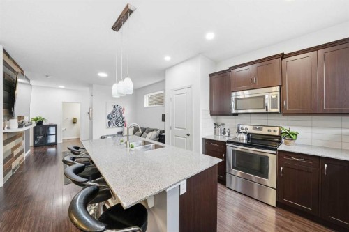 24 Legacy Glen View Se, Calgary, AB - Indoor Photo Showing Kitchen With Double Sink With Upgraded Kitchen