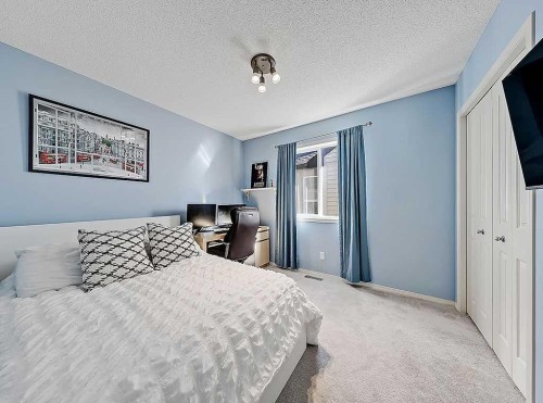 788 New Brighton Drive Se, Calgary, AB - Indoor Photo Showing Bedroom