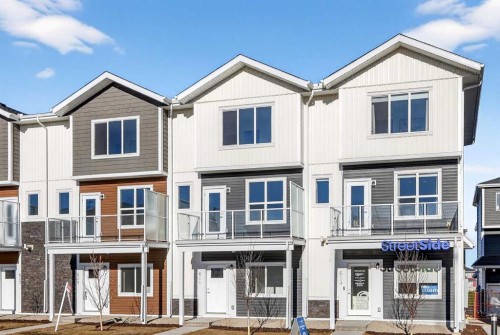 611-132 Red Embers Link Ne, Calgary, AB - Outdoor With Balcony With Facade