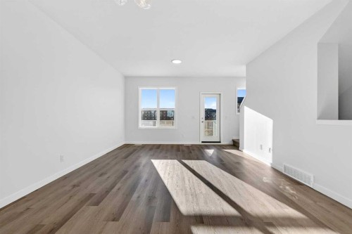 609-132 Red Embers Link Ne, Calgary, AB - Indoor Photo Showing Other Room