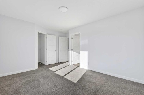 609-132 Red Embers Link Ne, Calgary, AB - Indoor Photo Showing Other Room