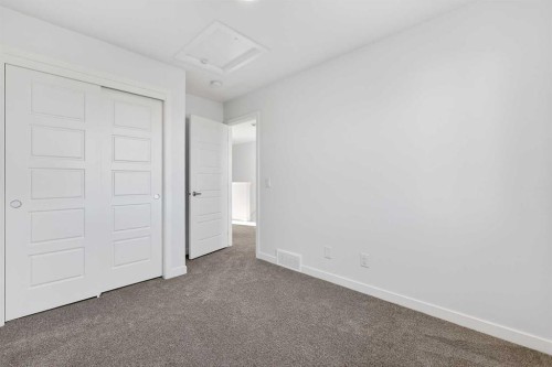 609-132 Red Embers Link Ne, Calgary, AB - Indoor Photo Showing Other Room