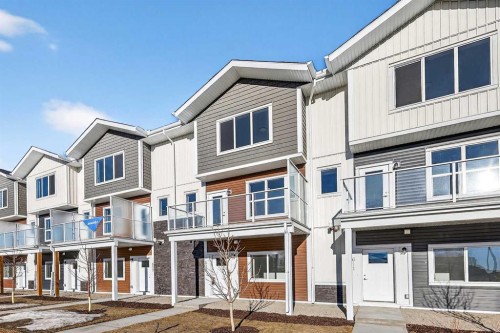 609-132 Red Embers Link Ne, Calgary, AB - Outdoor With Balcony With Facade