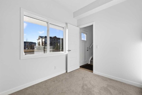 609-132 Red Embers Link Ne, Calgary, AB - Indoor Photo Showing Other Room