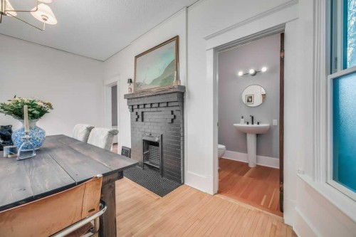 2123 16 Street Sw, Calgary, AB - Indoor With Fireplace