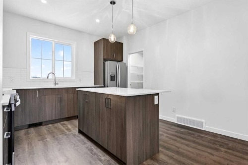 92 Creekside Drive Sw, Calgary, AB - Indoor Photo Showing Kitchen With Upgraded Kitchen