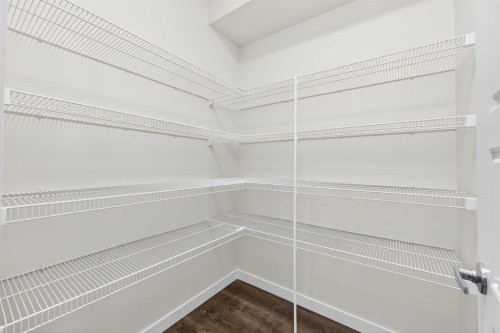 92 Creekside Drive Sw, Calgary, AB - Indoor With Storage