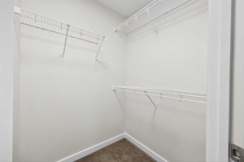 92 Creekside Drive Sw, Calgary, AB - Indoor With Storage