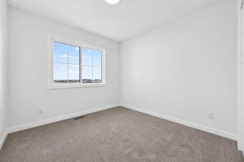 92 Creekside Drive Sw, Calgary, AB - Indoor Photo Showing Other Room