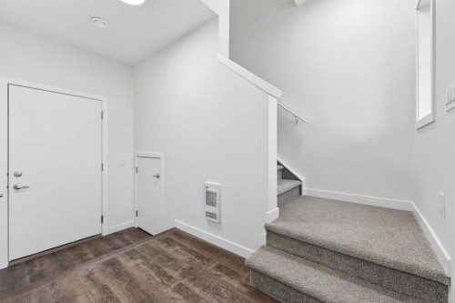 92 Creekside Drive Sw, Calgary, AB - Indoor Photo Showing Other Room