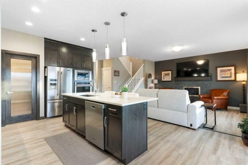 67 Fireside Terrace, Cochrane, AB - Indoor Photo Showing Kitchen With Upgraded Kitchen