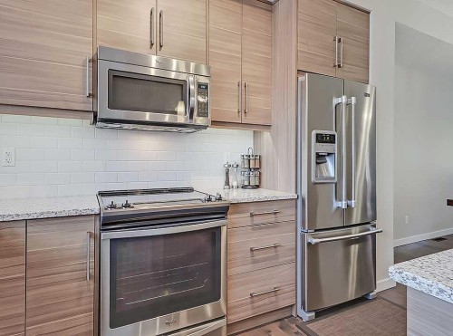 117 Nolancrest Common Nw, Calgary, AB - Indoor Photo Showing Kitchen With Stainless Steel Kitchen With Upgraded Kitchen
