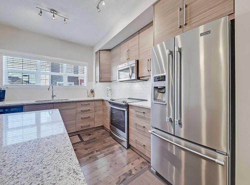 117 Nolancrest Common Nw, Calgary, AB - Indoor Photo Showing Kitchen With Stainless Steel Kitchen