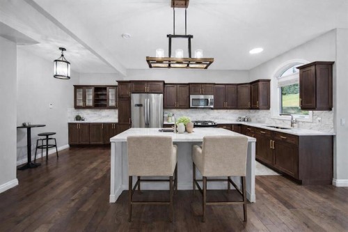 187 Gleneagles View, Cochrane, AB - Indoor Photo Showing Kitchen With Upgraded Kitchen